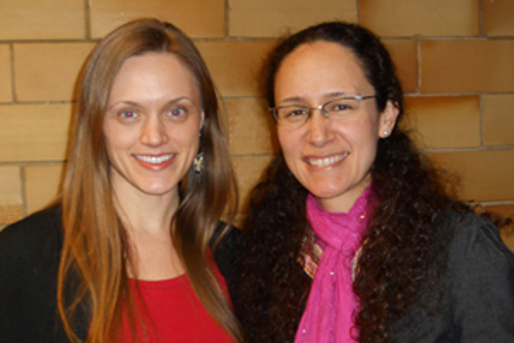 Social work professor collaborates with student on two publications: photo shows MSW student Blaire Hysjulien (left) with her mentor Catherine Marrs Fuchsel. Photo by Pam Kilpatrick.
