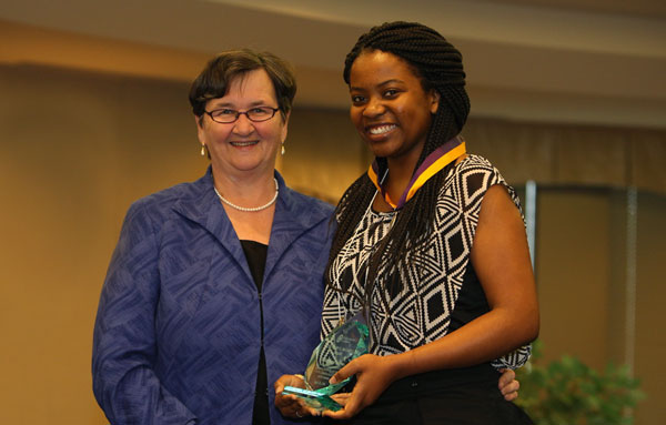 President Andrea Lee, IHM with Mary E. McCahill Award-winner Makabongwe Ngulube '16.