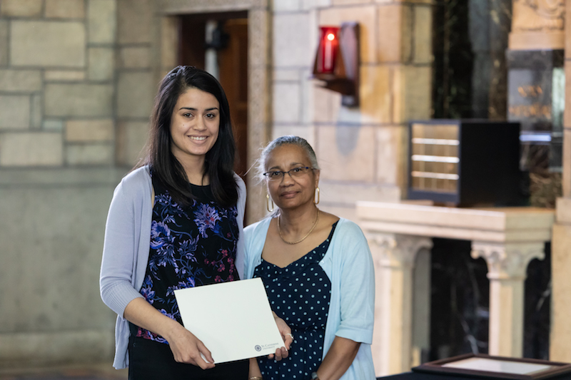 Caitlin Keo presented with a staff award by Pat Pratt-Cook