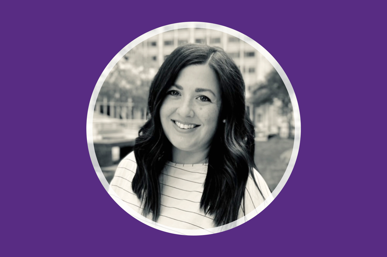 In black and white and on a purple background, portrait of MSN Nurse Educator Alumna Kelly Hintz, RN, MSN’20