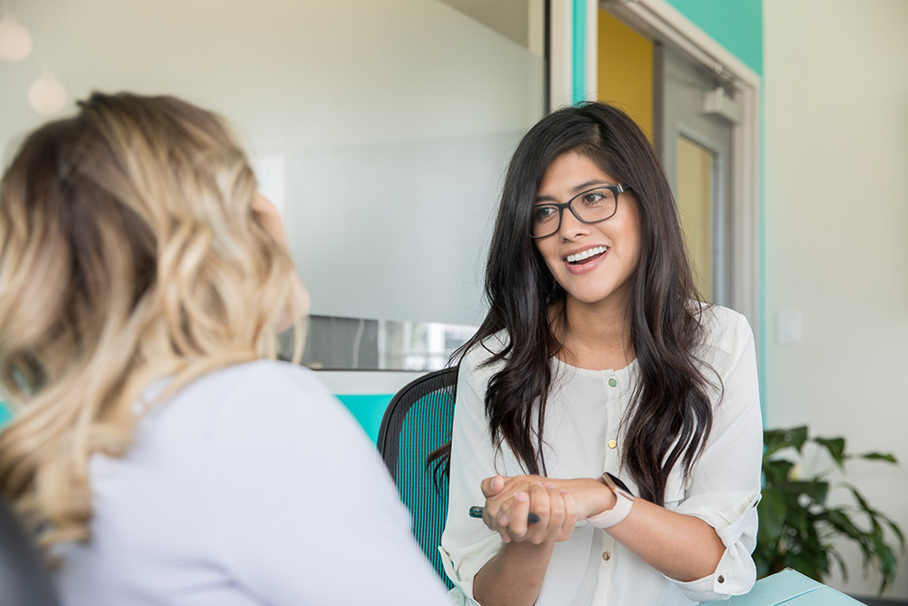 Social worker conversating with a patient