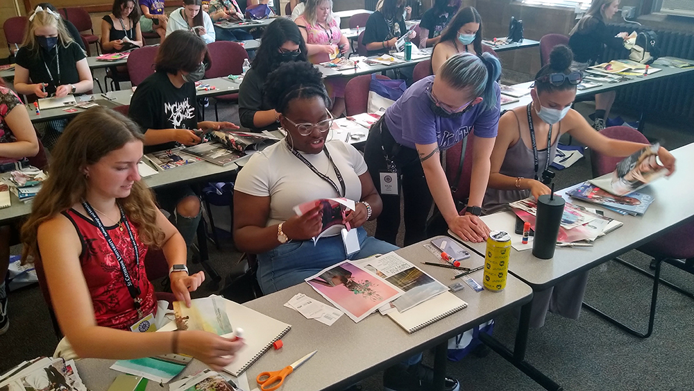 students working at desks at Summer Fashion Workshop