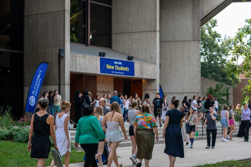 Community members gathering for Opening Celebration