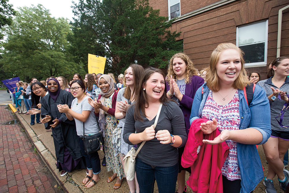 Students welcoming visitors on campus
