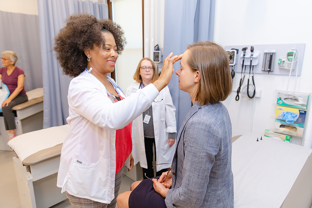 Family nurse working with patient