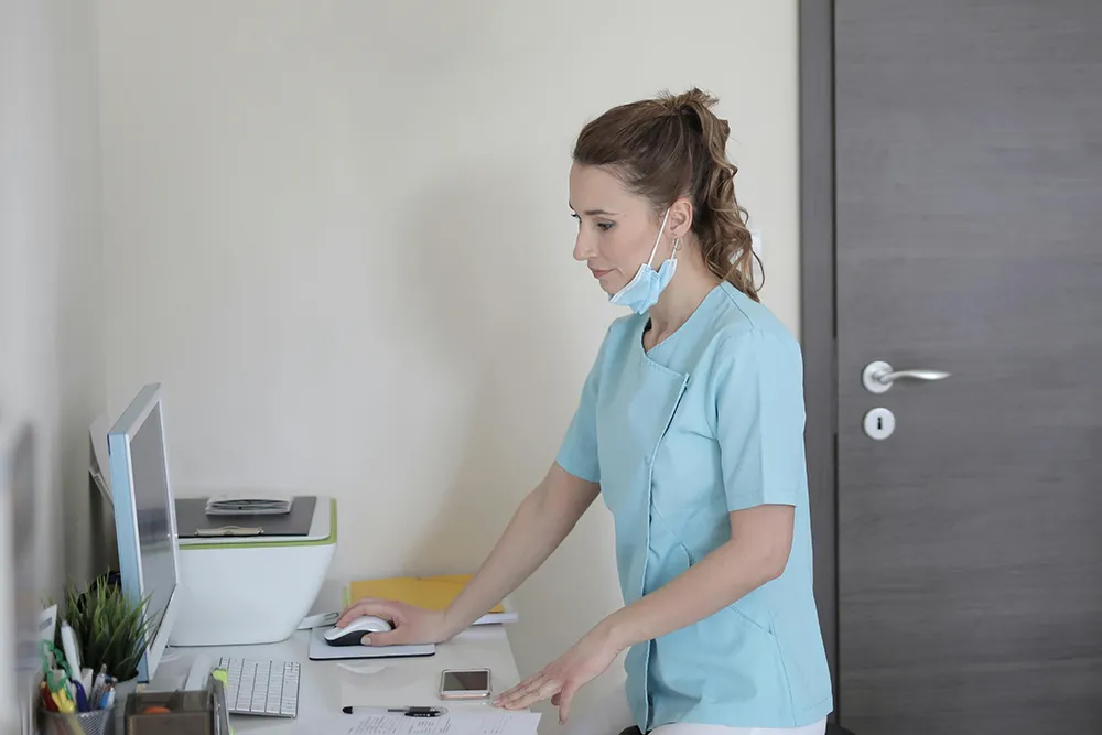 Nurse student working on computer