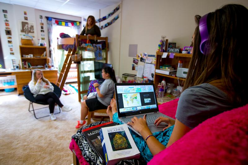 Students hanging out in dorm room