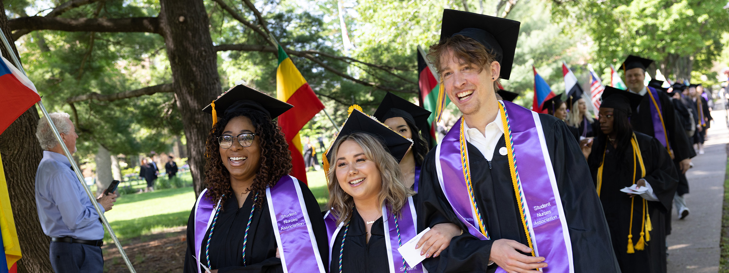CFA students walking in graduation