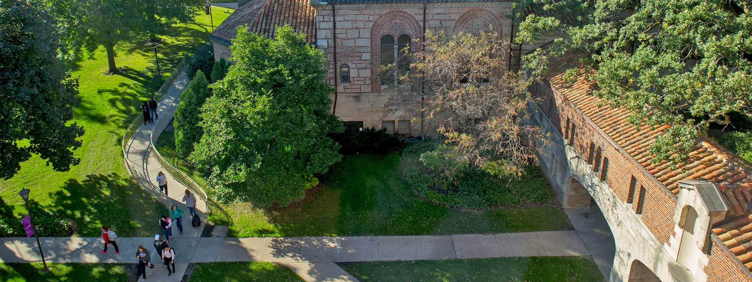 Arial shot of campus with students commuting to class