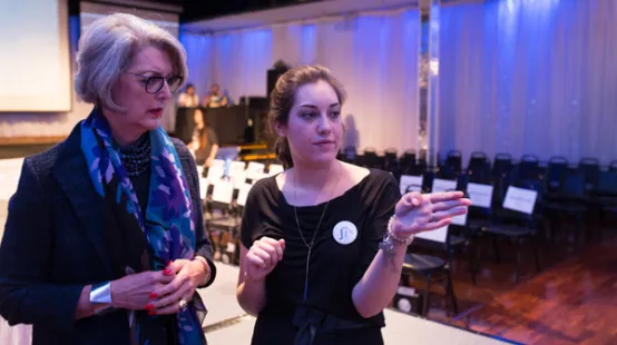 President Roloff and Briana Turnbull ‘17 at the 2017 Katwalk, where Turnbull's women's bike wear collection was unveiled. Photo by Rebecca Slater '10 / By Rebecca Studios