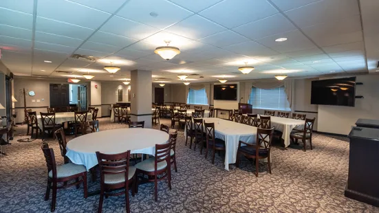 President's Dining Room from southeast corner, view of set tables, tv screen