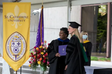 Provost Thomas with graduate