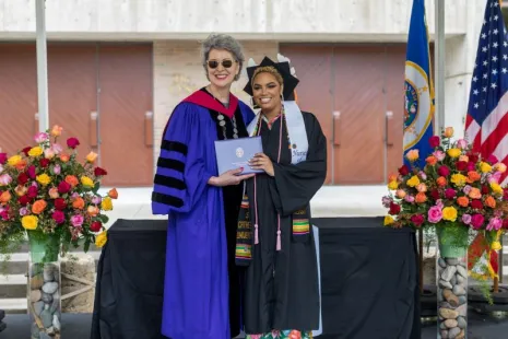 President Roloff with graduate