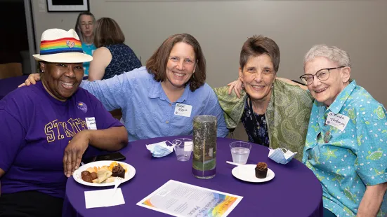 Alums gather for a photo at the LGBTQ+ Alum Celebration at Reunion 2022.