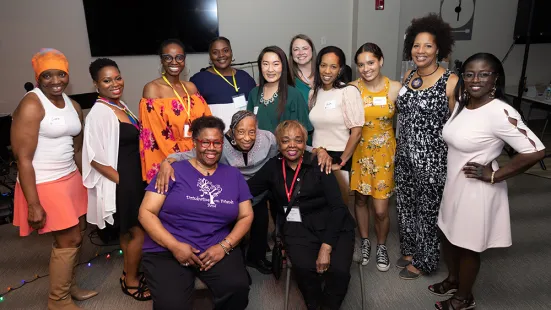 Alumni gather for a photo at the Reunion 2022 BIPOC Alumni Celebration.