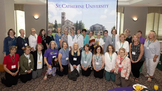 Alumni gather for a photo at Reunion 2022.
