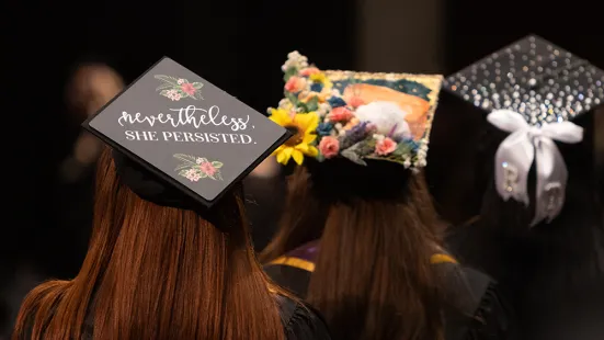 Graduate caps depicted at ceremony