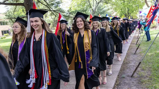 Group of graduates process to the ceremony