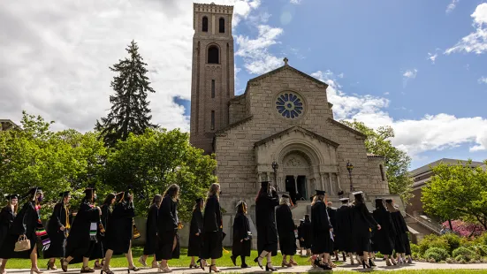 Gradates process by Our Lady of Victory Chapel