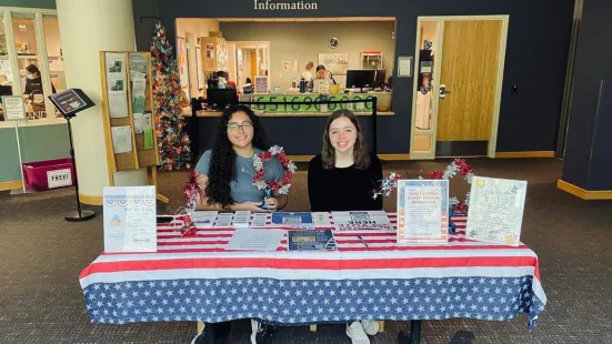 Students volunteering at voter table