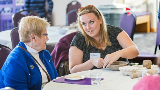 Older and younger women talking