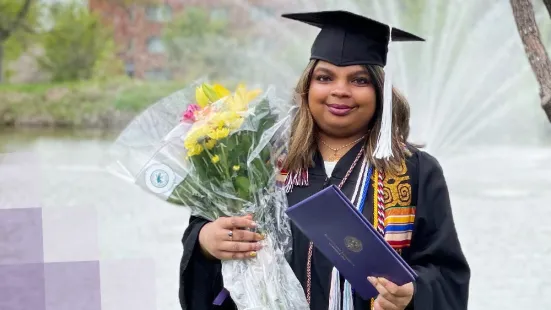 Portrait of Lakshmi Gunawardena in a graduation gown
