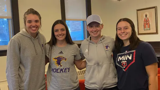 A group of student-athletes volunteering