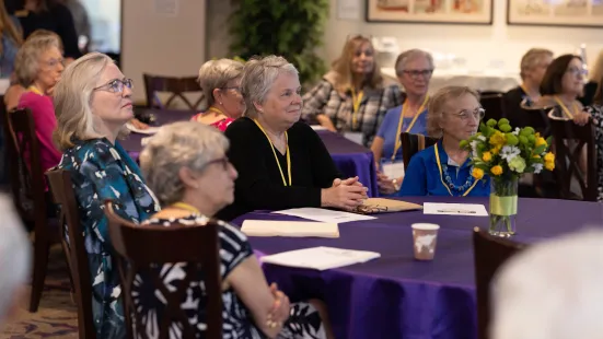 Alumni listen to a presentation at Reunion