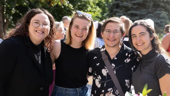 Young alumni smile at Reunion