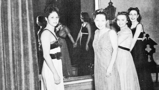 Older students in front of mirror
