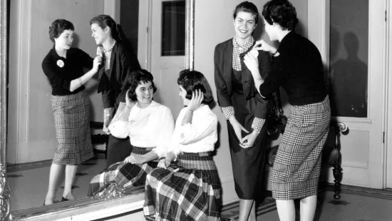 Older students in front of mirror