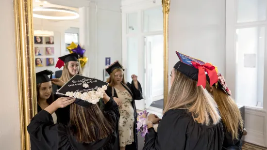 2022 students in front of mirror 