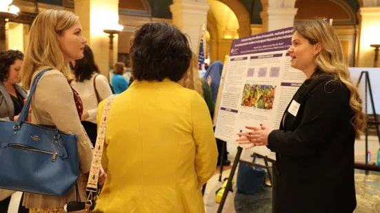 A student explains their research 
