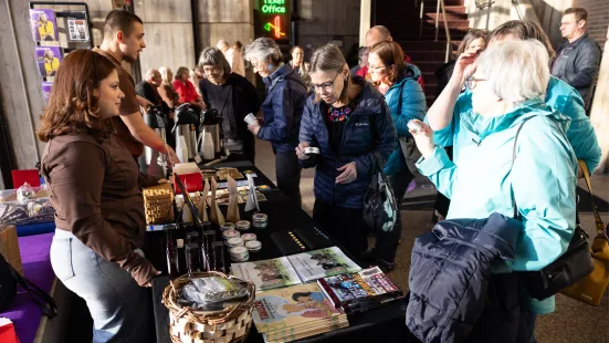 Guests browse tables in the O'Shaughnessy lobby