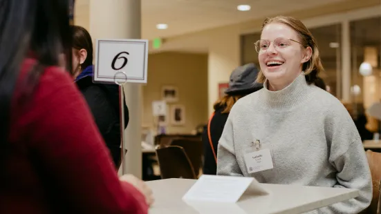 Attendee laughing 