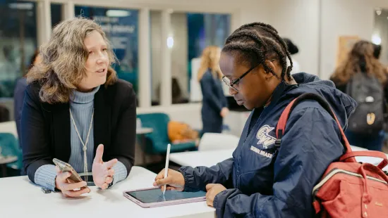 Professor and student working together 