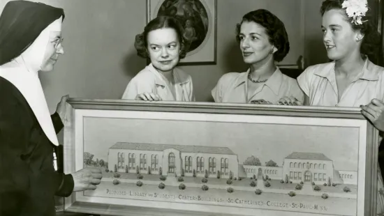 Archival photo of Ruth and coworkers  