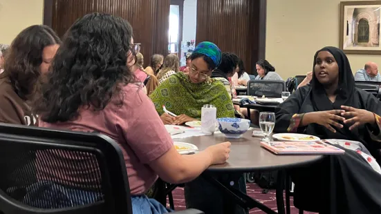 St. Kate's student Nesteho Abdi in conversation with workshop attendees
