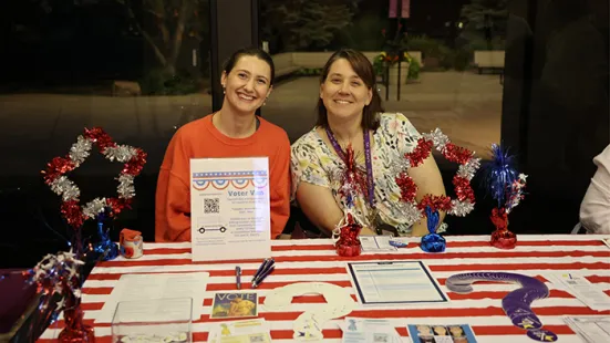 An organization tabling in the lobby to encourage voting.