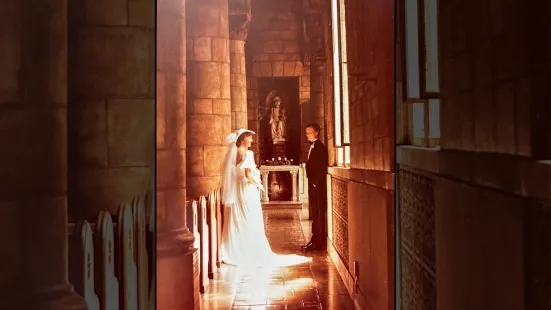 A bride and groom in Our Lady of Victory.
