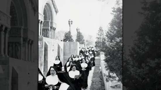 Nuns walking in front of the Chapel.