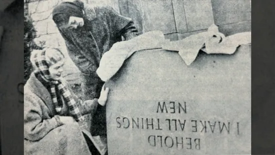 Two students examining the Chapel's altar.