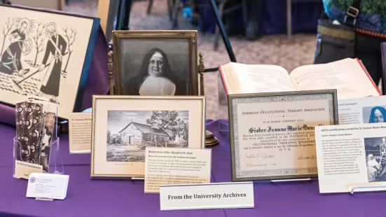 Items like photographs and a certification from the University's Archives