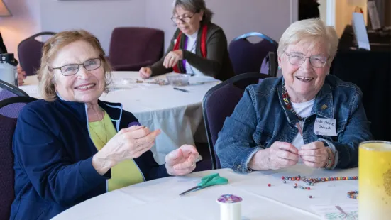 Participants doing beadwork.