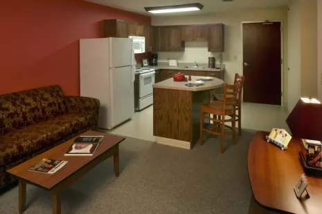 Rauenhorst Hall kitchenette and living room.