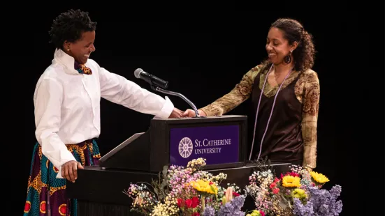 Maisah Blanton ’16 welcomes Eva Ngono ’25 to podium