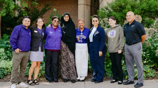 President Evans poses with the event's speakers outside The O'Shaughnessy.