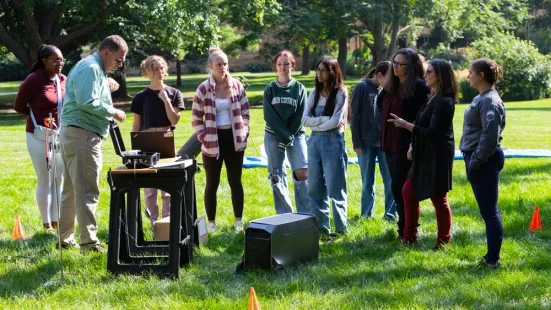 A group of students with Erick Agrimson (far left), Kelly Weinersmith, PhD, (right), and Paula Furey, PhD (far right).