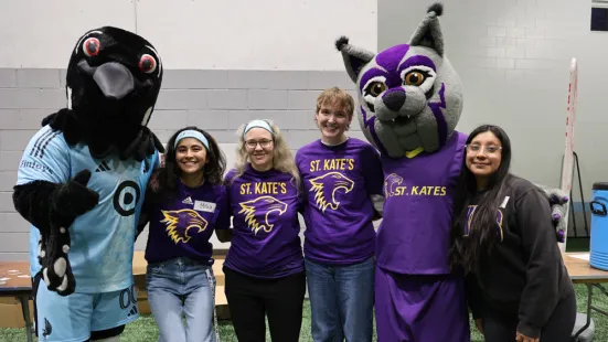 Students pose with the MN Loons' mascot and Katie Cat.