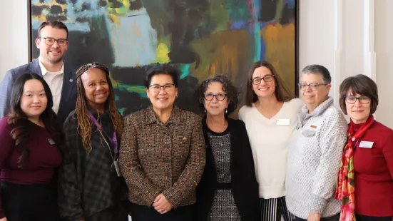 Mayor Her poses for a photo with St. Kate's leadership, including President Marcheta P. Evans, PhD